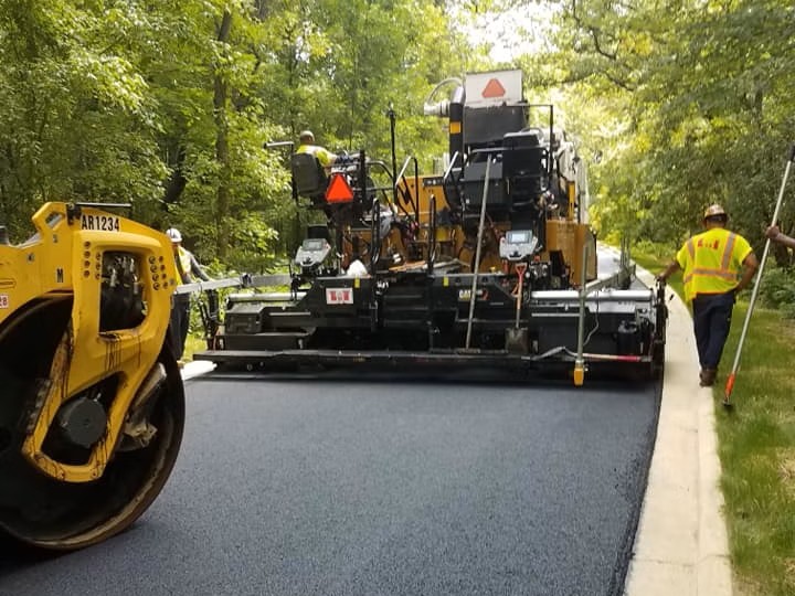 Asphalt driveway paving crew paving a parking lot in South Carolina